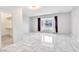 Spacious main bedroom with a walk in closet and large window with bench seating at 2880 Placita Ct, Las Vegas, NV 89121