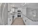 Bright and modern kitchen with stainless steel appliances and granite countertops at 2880 Placita Ct, Las Vegas, NV 89121