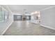 Spacious living room including a fireplace and adjacent to the kitchen at 2880 Placita Ct, Las Vegas, NV 89121