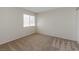 Neutral bedroom with carpeting, a window providing natural light, and closet at 2924 Pleasant Lake Dr, Las Vegas, NV 89117