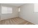 Neutral bedroom featuring carpeting, and windows for ample natural light at 2924 Pleasant Lake Dr, Las Vegas, NV 89117