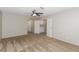 Neutral bedroom with carpeting, open doorway, and cabinet perfect for storage at 2924 Pleasant Lake Dr, Las Vegas, NV 89117