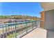A beautiful mountain and neighborhood view from the balcony shows the potential for serenity at 30 Strada Di Villaggio # 441, Henderson, NV 89011