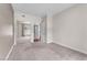 Spacious carpeted bedroom features neutral walls and a mirrored closet to maximize space at 30 Strada Di Villaggio # 441, Henderson, NV 89011