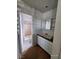 Bathroom featuring a vanity with granite countertop and a tiled shower at 3112 Piedmont Ave, Las Vegas, NV 89102