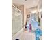 Bathroom featuring a glass enclosed shower and vanity with drawers at 3114 Molinos Dr, Las Vegas, NV 89141