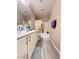 Bathroom with a dual sink vanity and a shower-tub combo at 3114 Molinos Dr, Las Vegas, NV 89141