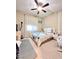Bright bedroom with a ceiling fan and natural light at 3114 Molinos Dr, Las Vegas, NV 89141
