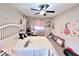 Bedroom with colorful wall decals and a full size bed at 3114 Molinos Dr, Las Vegas, NV 89141