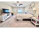 Primary bedroom with large windows and a ceiling fan at 3114 Molinos Dr, Las Vegas, NV 89141