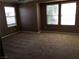 Spacious main bedroom featuring plush carpeting and bright windows at 3175 Obscured Light Walk, Henderson, NV 89044