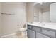Bathroom featuring tiled floors, single vanity, toilet and shower/tub combo at 32 E Serene Ave # 207, Las Vegas, NV 89123