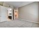 Spacious bedroom featuring neutral carpeting, ensuite bathroom and walk in closet access at 32 E Serene Ave # 207, Las Vegas, NV 89123