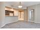 Open living area, with a view of the kitchen and easy access to other rooms at 32 E Serene Ave # 207, Las Vegas, NV 89123