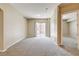 Bright living room with a view of the balcony, creating an inviting and open atmosphere at 32 E Serene Ave # 207, Las Vegas, NV 89123
