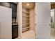 Walk-in pantry with multiple shelves, providing plenty of storage space at 32 E Serene Ave # 207, Las Vegas, NV 89123