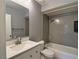 Bathroom with shower-tub, updated vanity and brushed nickel faucet at 349 Esquina Dr, Henderson, NV 89014