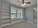 Inviting bedroom showcasing window nook with built-in shelving, ideal for reading and relaxation at 349 Esquina Dr, Henderson, NV 89014