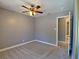 Comfortable bedroom with a ceiling fan; bathroom entrance visible to the right at 349 Esquina Dr, Henderson, NV 89014
