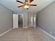 Bedroom with plush carpet, and multiple doors at 349 Esquina Dr, Henderson, NV 89014
