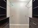 Walk-in closet with custom built-in shelves and drawers at 349 Esquina Dr, Henderson, NV 89014
