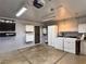 Functional garage with washer, dryer, and overhead storage at 349 Esquina Dr, Henderson, NV 89014