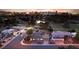 A beautiful aerial view showcases these lovely homes in a golf community with the Las Vegas skyline as the backdrop at 3597 Cochise Ln, Las Vegas, NV 89169