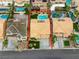 An aerial view showcases a house with a pool and spa outlined in red for real estate purposes at 3692 River Canyon Rd, Las Vegas, NV 89129