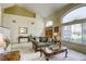 Spacious living room showcasing high ceilings, large windows, and stylish furnishings at 3692 River Canyon Rd, Las Vegas, NV 89129