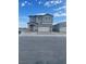 Two-story home featuring a two-car garage and neutral color palette at 4205 Mount Bonnell Ave, North Las Vegas, NV 89081