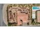 Aerial view of a single story home with desert landscaping, a pool and basketball court at 4317 Velvet Ridge Ct, Las Vegas, NV 89129
