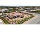 Aerial view of the home showing the backyard, extended patio, desert landscaping, and surrounding neighborhood at 4317 Velvet Ridge Ct, Las Vegas, NV 89129