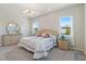 Inviting bedroom with carpeted floor, natural light, and neutral tones, creating a serene atmosphere at 4317 Velvet Ridge Ct, Las Vegas, NV 89129