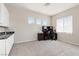 Bonus room featuring carpet floors, a sink, and a desk area at 4317 Velvet Ridge Ct, Las Vegas, NV 89129