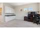Bonus room featuring carpet floors, a sink, and a desk area at 4317 Velvet Ridge Ct, Las Vegas, NV 89129