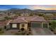 Beautiful single story home with desert landscaping and three car garage and mountain views at 4317 Velvet Ridge Ct, Las Vegas, NV 89129