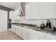 Well-equipped kitchen featuring white cabinets, modern appliances, and sleek countertops for culinary enthusiasts at 4317 Velvet Ridge Ct, Las Vegas, NV 89129