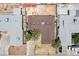 Aerial view of the property shows the roof, yard, driveway, and surrounding houses at 4516 E Flamingo Rd, Las Vegas, NV 89121