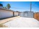 Backyard featuring xeriscaping, a shed, and privacy fence at 4516 E Flamingo Rd, Las Vegas, NV 89121