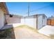 Backyard featuring shed, patio area, and block wall, providing a private outdoor space at 4516 E Flamingo Rd, Las Vegas, NV 89121