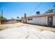 View of backyard featuring a patio area, fence and the rear of the home at 4516 E Flamingo Rd, Las Vegas, NV 89121