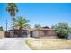 Charming single-story brick home featuring desert landscaping and a two-car garage at 4516 E Flamingo Rd, Las Vegas, NV 89121