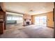 Spacious living room area with fireplace and lots of windows for light at 4516 E Flamingo Rd, Las Vegas, NV 89121