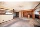 Open-concept living room showing brick accents, open archways, and access to multiple rooms at 4516 E Flamingo Rd, Las Vegas, NV 89121