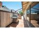 Covered patio featuring tile floors, fence and a barbecue grill at 4516 E Flamingo Rd, Las Vegas, NV 89121