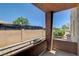 Outdoor balcony with brick walls and wrought iron fencing for privacy and security on a bright day at 4730 E Craig Rd # 1005, Las Vegas, NV 89115
