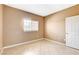 Bedroom features tile flooring and a window for natural light at 4730 E Craig Rd # 1005, Las Vegas, NV 89115