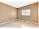 A neutral bedroom with tile flooring and natural light at 4730 E Craig Rd # 1005, Las Vegas, NV 89115