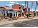 Inviting clubhouse entrance with well-maintained landscaping, creating a welcoming and accessible community space at 4730 E Craig Rd # 1005, Las Vegas, NV 89115