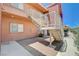 Second story apartment with metal staircase and desert landscaping in complex at 4730 E Craig Rd # 1005, Las Vegas, NV 89115